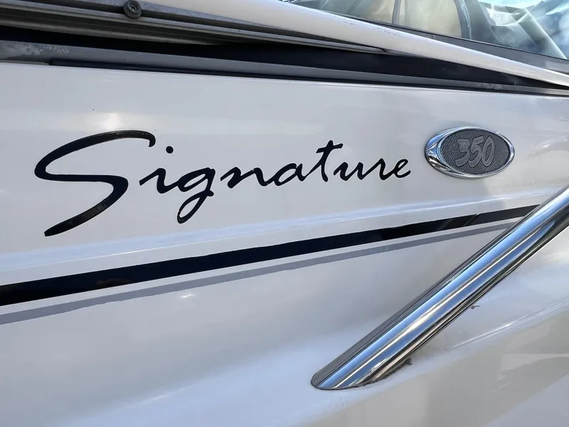 Slide: The Image of 2005 Chaparral Signature 350 boat logo and chrome detail. - 4