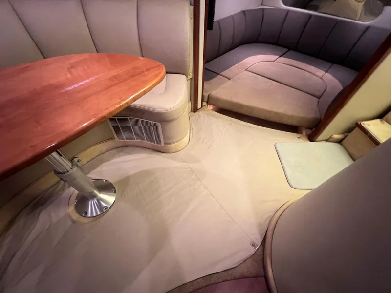 Slide: The Image of 2005 Chaparral Signature 350 interior with dining area and cozy seating. - 49