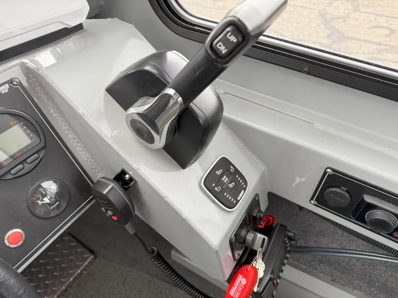 Slide: The Image of Control panel of 2023 Hewescraft 240 Ocean Pro ET HT boat. - 13