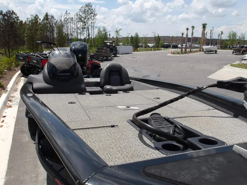 Slide: The Image of 2021 Tracker Pro Team 175 TXW fishing boat parked outdoors on a sunny day. - 9