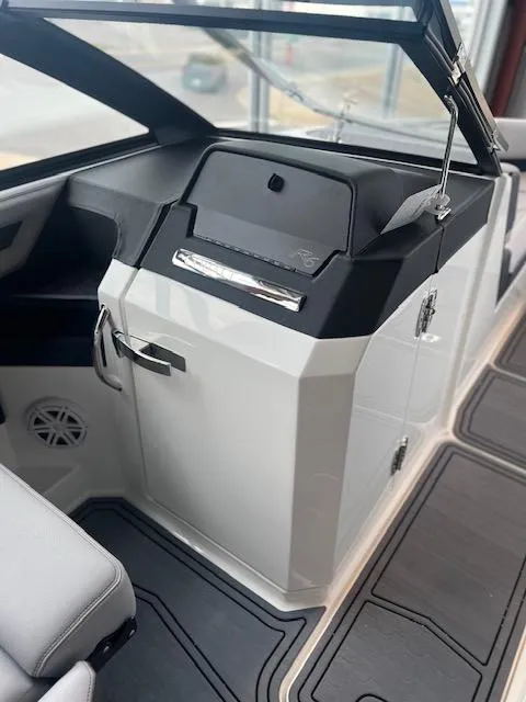 Slide: The Image of 2025 Cobalt R6 Surf boat interior with sleek dashboard and modern design. - 10