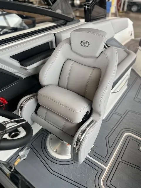 Slide: The Image of Captain's chair in 2025 Cobalt R6 Surf boat, featuring sleek design and premium upholstery. - 13