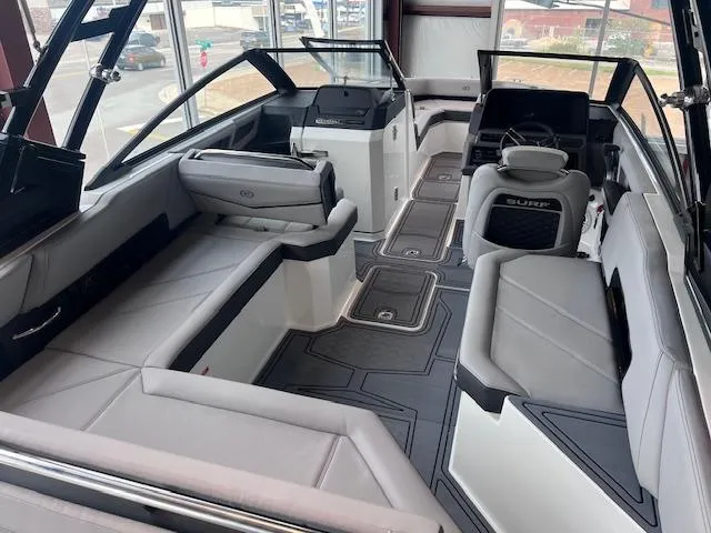 Slide: The Image of 2025 Cobalt R6 Surf boat interior with sleek seating and modern design. - 24