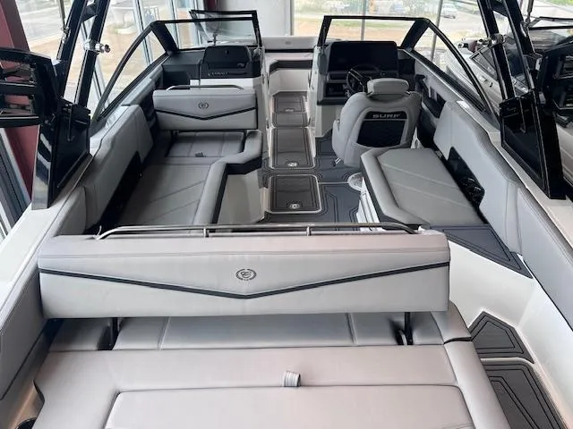 Slide: The Image of 2025 Cobalt R6 Surf boat interior with sleek, modern seating and advanced dashboard design. - 25
