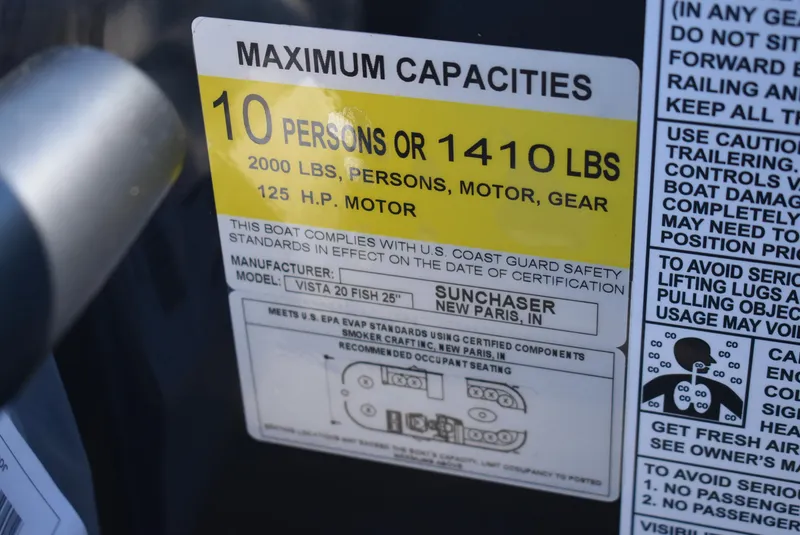 Slide: The Image of 2024 SunChaser Vista 20 Fish boat capacity label, 10 persons or 1410 lbs, 125 HP motor. - 11