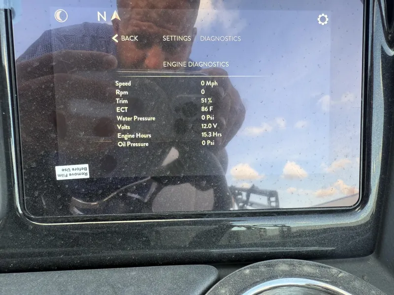 Slide: The Image of 2024 Regency 250 DL3 engine diagnostics display showing speed, RPM, trim, and other metrics. - 19