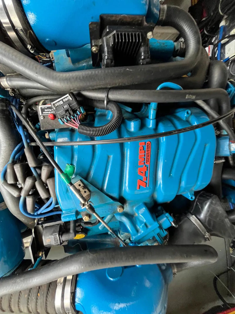 Slide: The Image of Engine of a 2000 Tiara Yachts 3100 Open, featuring a 7.4 MPI motor. - 16