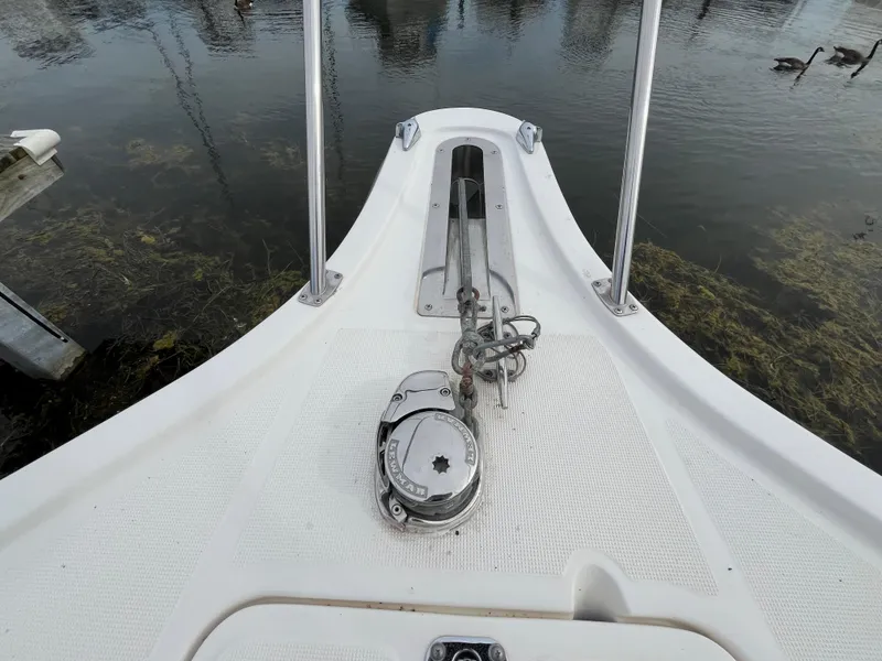 Slide: The Image of Bow of 2000 Tiara Yachts 3100 Open with anchor and winch system. - 2