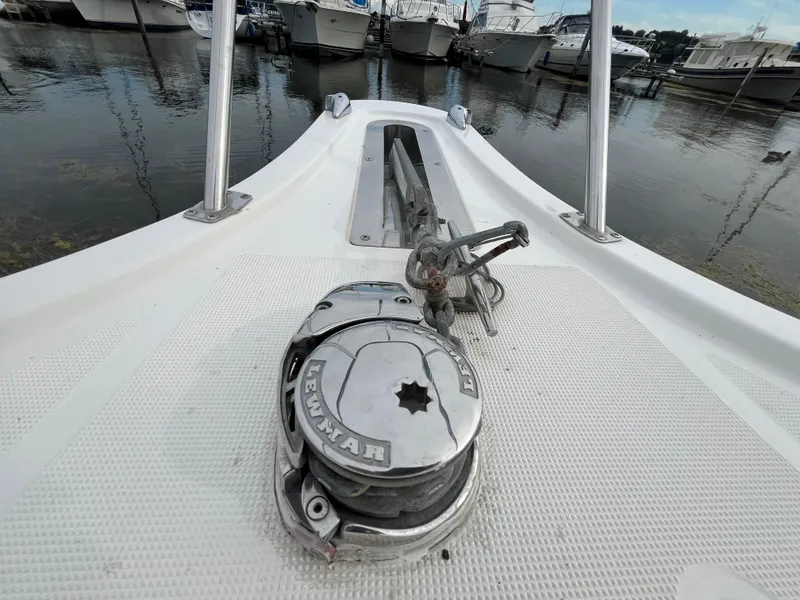 Slide: The Image of Bow of 2000 Tiara Yachts 3100 Open with anchor and winch system. - 3