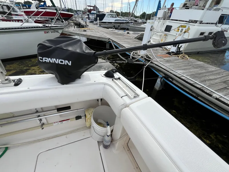 Slide: The Image of 2000 Tiara Yachts 3100 Open at dock with Cannon equipment, marina view. - 42