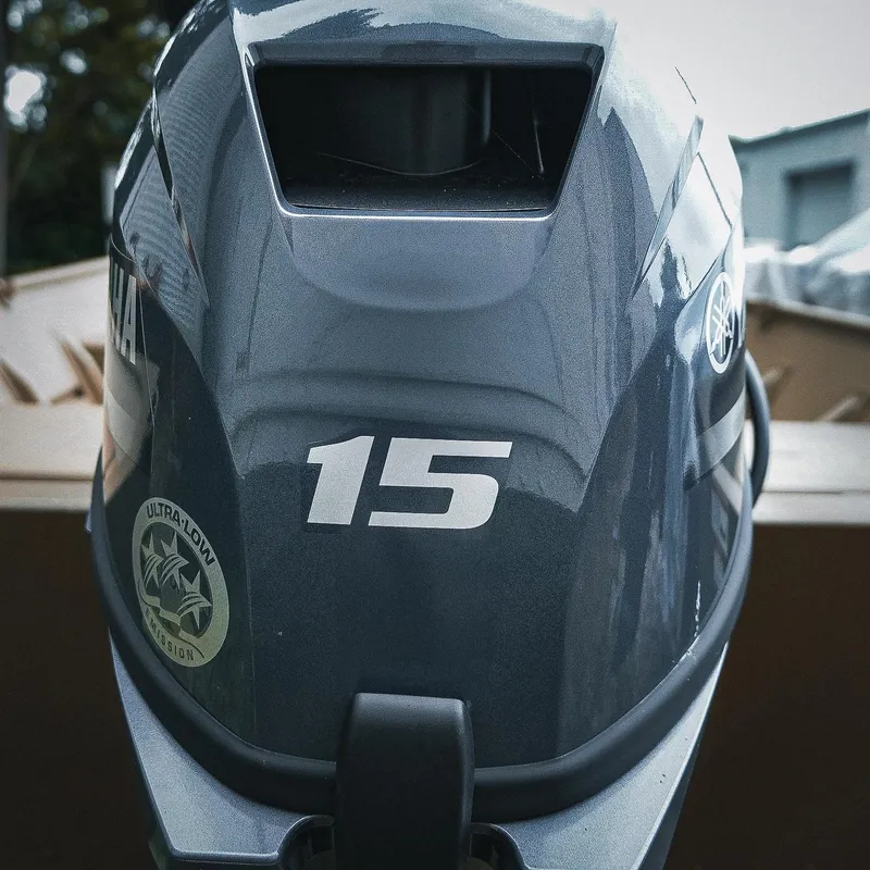 Slide: The Image of Outboard motor with "15" label on a 2025 G3 Gator Tough 1448 LW boat. - 3