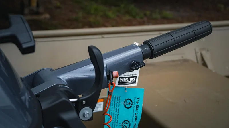 Slide: The Image of Close-up of a 2025 G3 Gator Tough 1448 LW boat handle with Yamalube tag. - 7