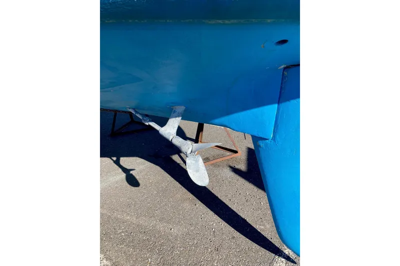 Slide: The Image of Propeller and rudder of a 1982 Sabre 30 sailboat on dry dock. - 25