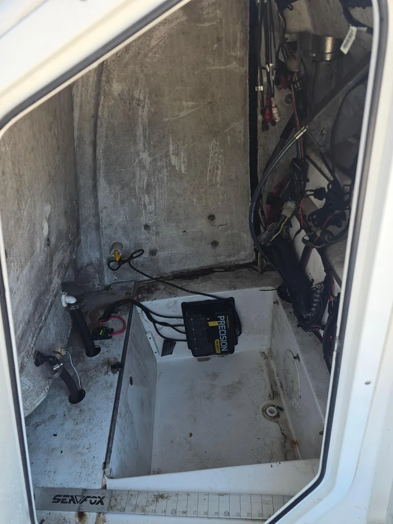 Slide: The Image of 2017 Sea Fox 240 Viper interior wiring and equipment compartment. - 10