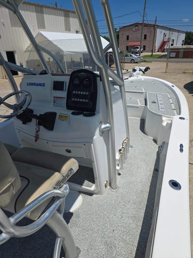 Slide: The Image of 2017 Sea Fox 240 Viper boat interior with steering console and seating. - 14
