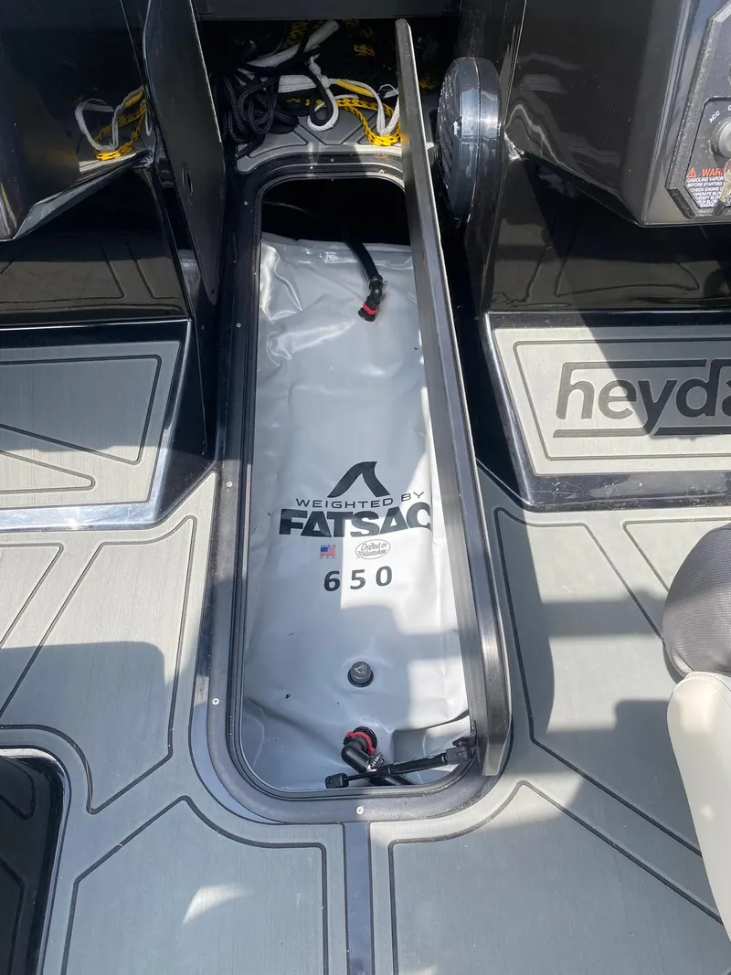 Slide: The Image of 2025 Heyday WTSurf boat with FatSac ballast system, enhancing weight distribution. - 21