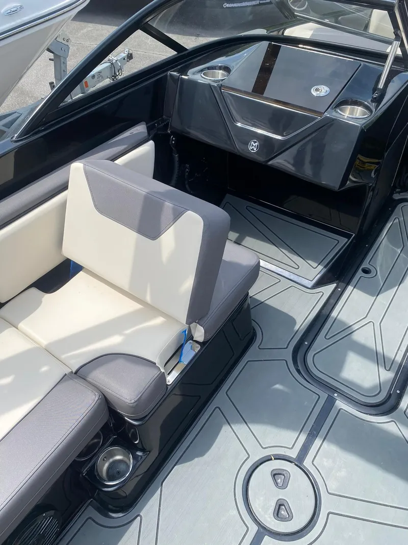 Slide: The Image of 2025 Heyday WTSurf boat interior with sleek seating and modern design. - 22