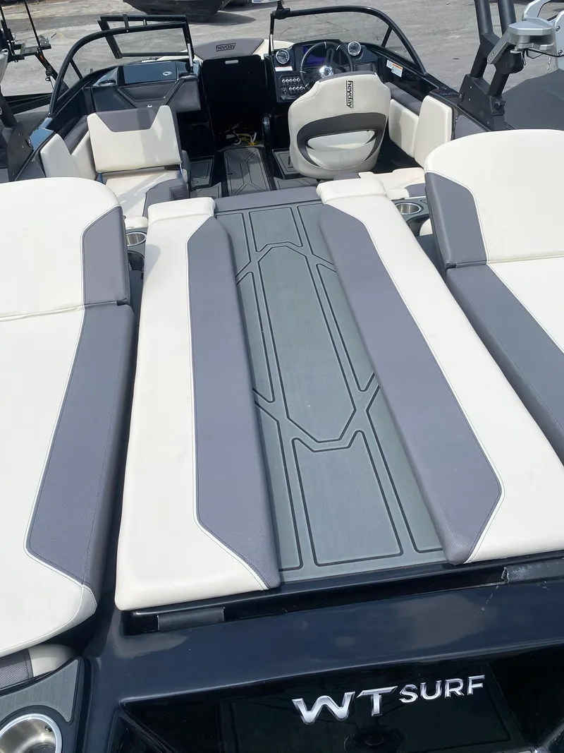 Slide: The Image of 2025 Heyday WTSurf boat interior with sleek seating and modern design. - 27