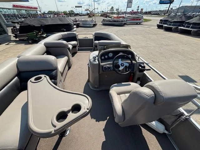 Slide: The Image of Pontoon boat interior with seating and steering console, Premier 225 Grand Majestic, 2009 model. - 19