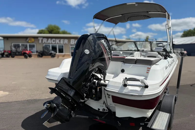 Slide: The Image of 2018 Tahoe 450TF boat with Mercury engine at Tracker Boats dealership. - 2