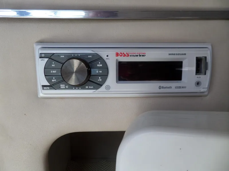 Slide: The Image of Marine audio system on a 1995 Sea Ray 250 Sundancer boat, featuring Bluetooth connectivity. - 36