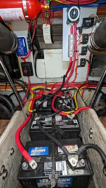 Slide: The Image of Electrical system of a 2004 Silverton 34 Convertible boat with batteries and wiring. - 29