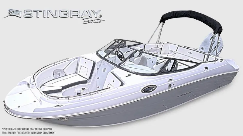 Slide: The Image of 2025 Stingray 231 DC boat with sleek design and modern features. - 2