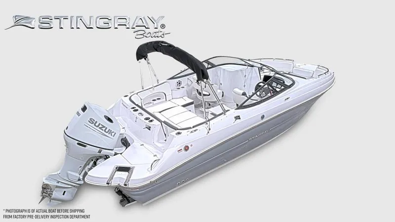 Slide: The Image of 2025 Stingray 231 DC boat with Suzuki engine, featuring sleek design and spacious seating. - 6