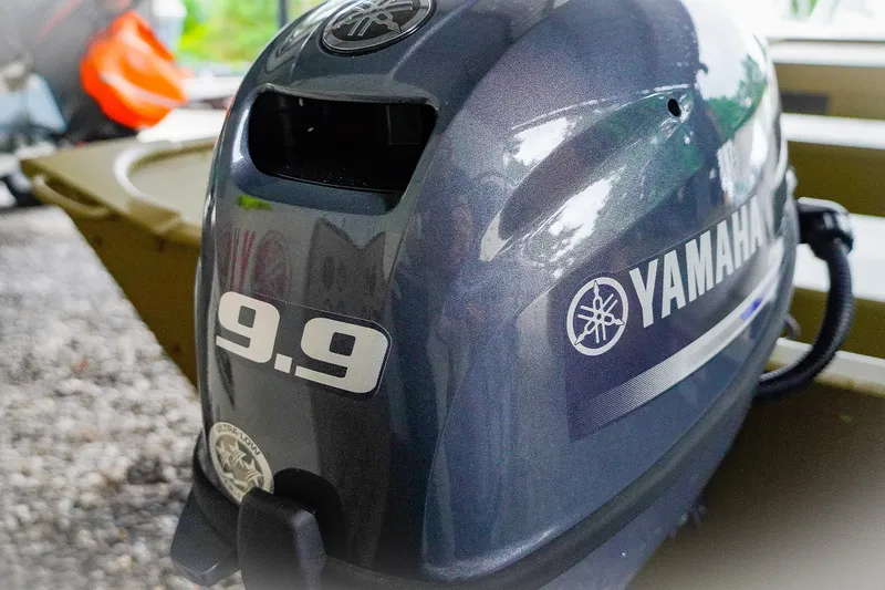 Slide: The Image of Yamaha 9.9 outboard motor on 2025 G3 Gator Tough 1448 LW boat. - 12