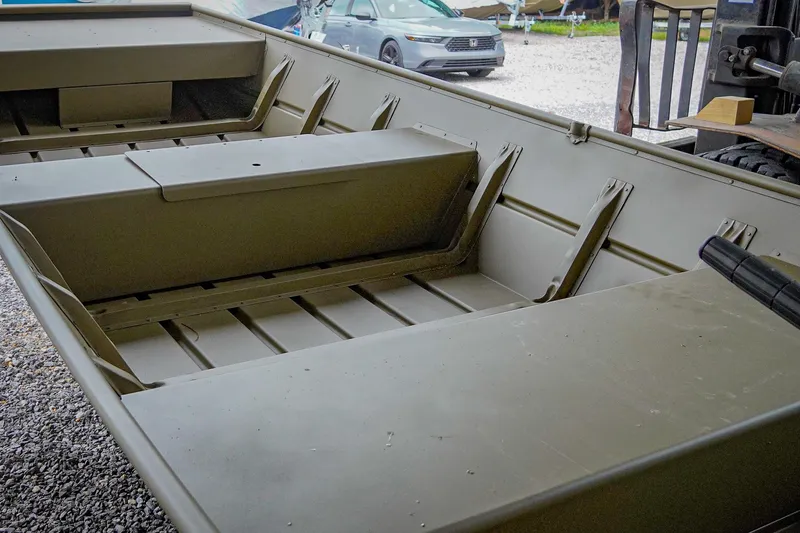 Slide: The Image of 2025 G3 Gator Tough 1448 LW boat interior with bench seating and storage. - 19