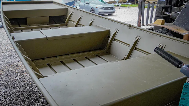 Slide: The Image of 2025 G3 Gator Tough 1448 LW boat interior, showcasing spacious seating and durable construction. - 2