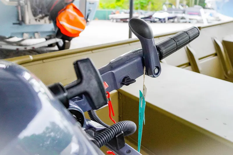 Slide: The Image of Close-up of 2025 G3 Gator Tough 1448 LW boat throttle handle. - 21