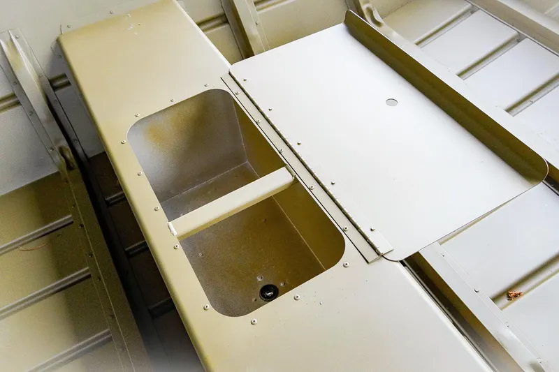 Slide: The Image of 2025 G3 Gator Tough 1448 LW boat interior with storage compartment. - 22