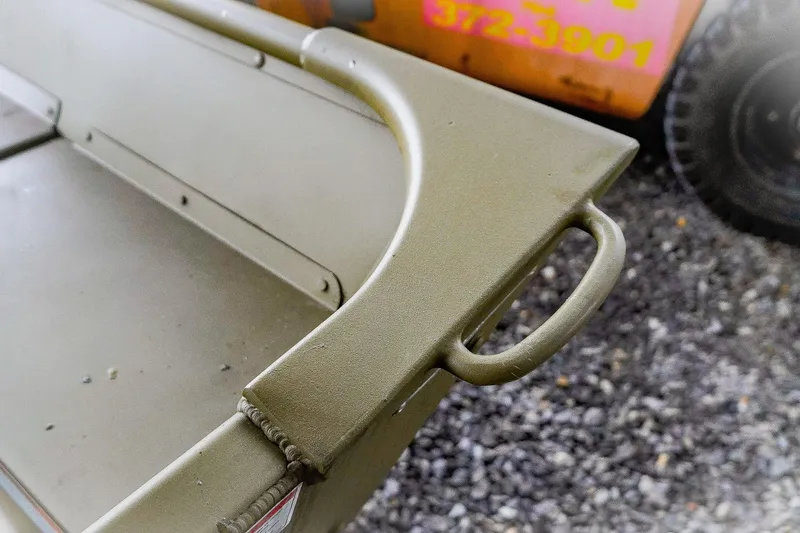 Slide: The Image of Close-up of 2025 G3 Gator Tough 1448 LW boat handle on gravel background. - 28