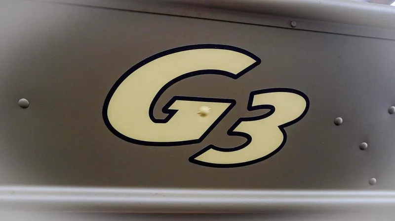 Slide: The Image of Close-up of G3 logo on 2025 Gator Tough 1448 LW boat. - 8