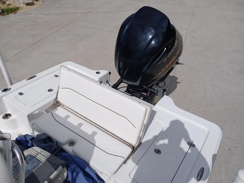 Slide: The Image of 2015 Sportsman Tournament 234 Bay Boat with Yamaha outboard motor, open storage compartment. - 10
