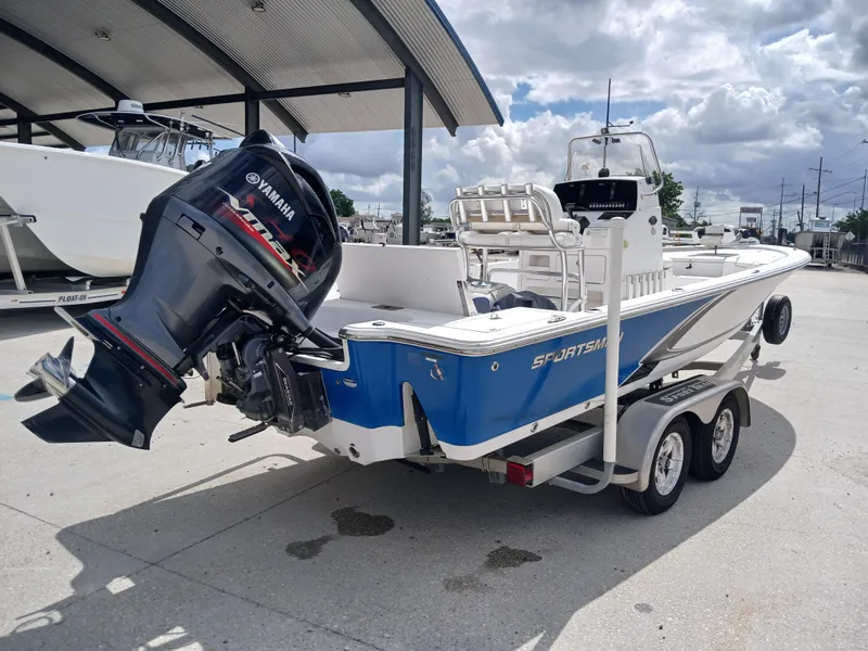 Slide: The Image of 2015 Sportsman Tournament 234 Bay Boat with Yamaha engine on trailer. - 20