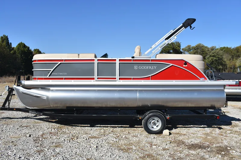 Slide: The Image of 2025 Godfrey Sweetwater 2086 SB pontoon boat on trailer, red and gray design. - 4