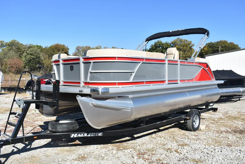 Slide: The Image of 2025 Godfrey Sweetwater 2086 SB pontoon boat on trailer, red and gray design. - 6
