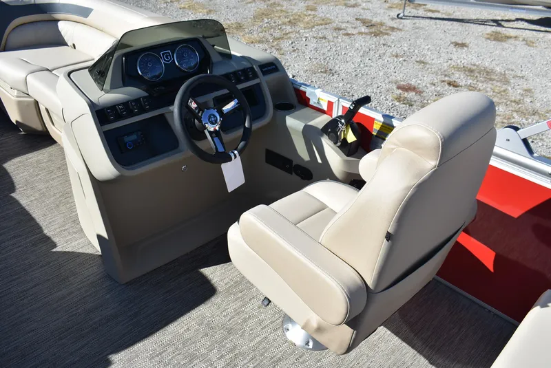 Slide: The Image of 2025 Godfrey Sweetwater 2086 SB boat interior with steering console and seating. - 8