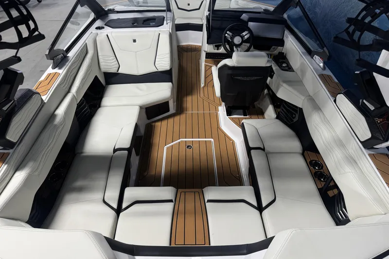Slide: The Image of 2026 Nautique Super Air Nautique G21 interior with luxurious seating and sleek design. - 6
