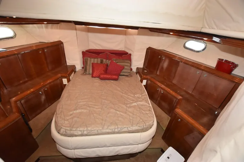 Slide: The Image of Luxurious cabin interior of 1998 Hatteras 74 Sport Deck yacht with wood cabinetry. - 31
