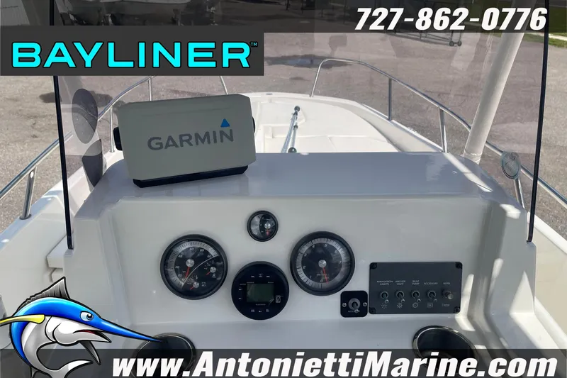 Slide: The Image of 2020 Bayliner Element F21 dashboard with Garmin GPS, gauges, and controls. - 11