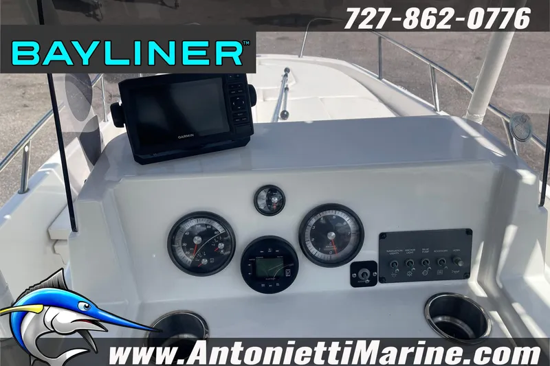 Slide: The Image of 2020 Bayliner Element F21 dashboard with Garmin display and control panel, Antonietti Marine branding. - 13