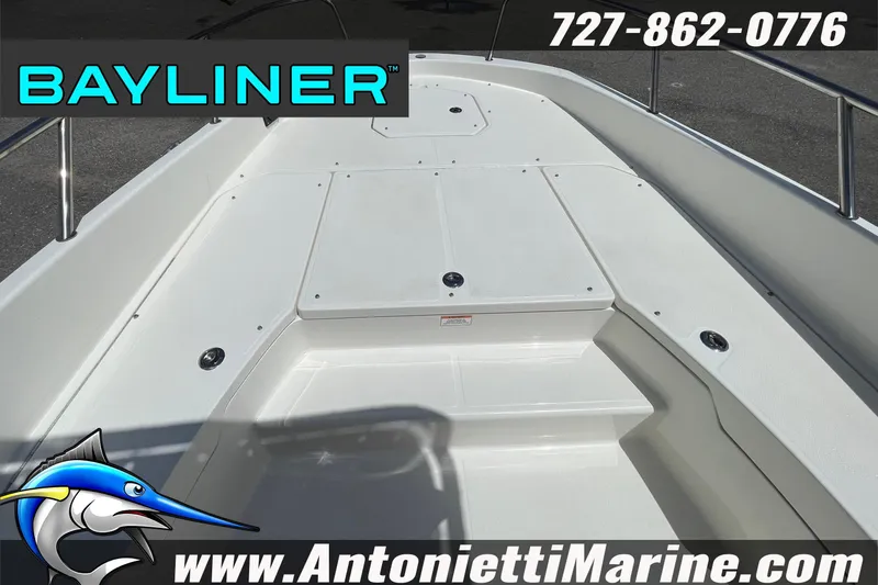 Slide: The Image of 2020 Bayliner Element F21 boat deck, featuring spacious seating and storage. - 26