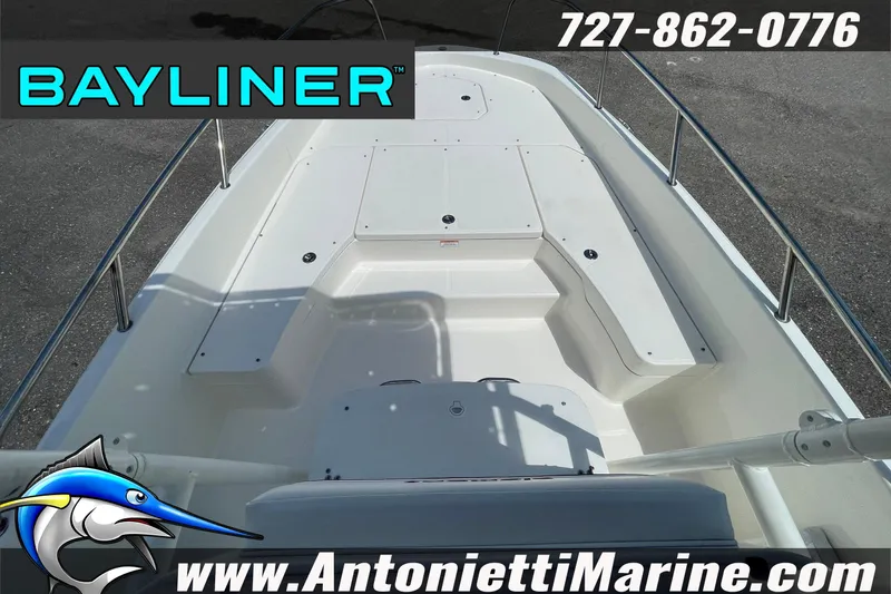 Slide: The Image of 2020 Bayliner Element F21 boat interior with seating, contact details, and website. - 28