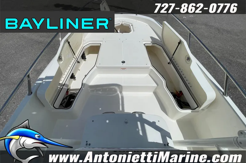 Slide: The Image of 2020 Bayliner Element F21 boat interior with open storage compartments, displayed by Antonietti Marine. - 29