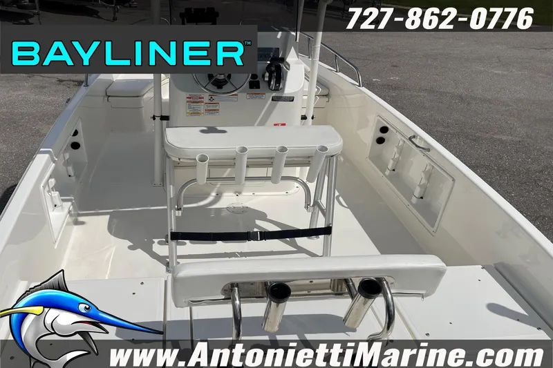 Slide: The Image of 2020 Bayliner Element F21 boat interior with seating and rod holders. - 39