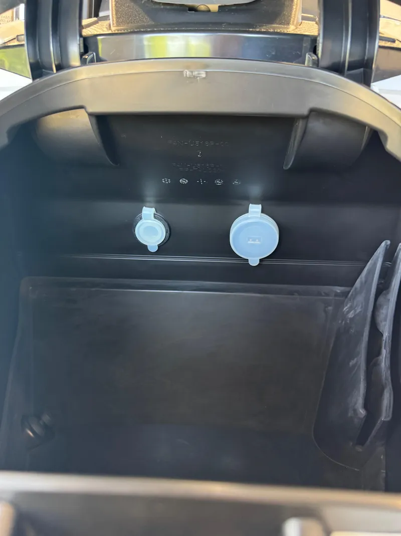 Slide: The Image of Storage compartment of 2025 Yamaha WaveRunner VX Cruiser, featuring dual access points. - 12