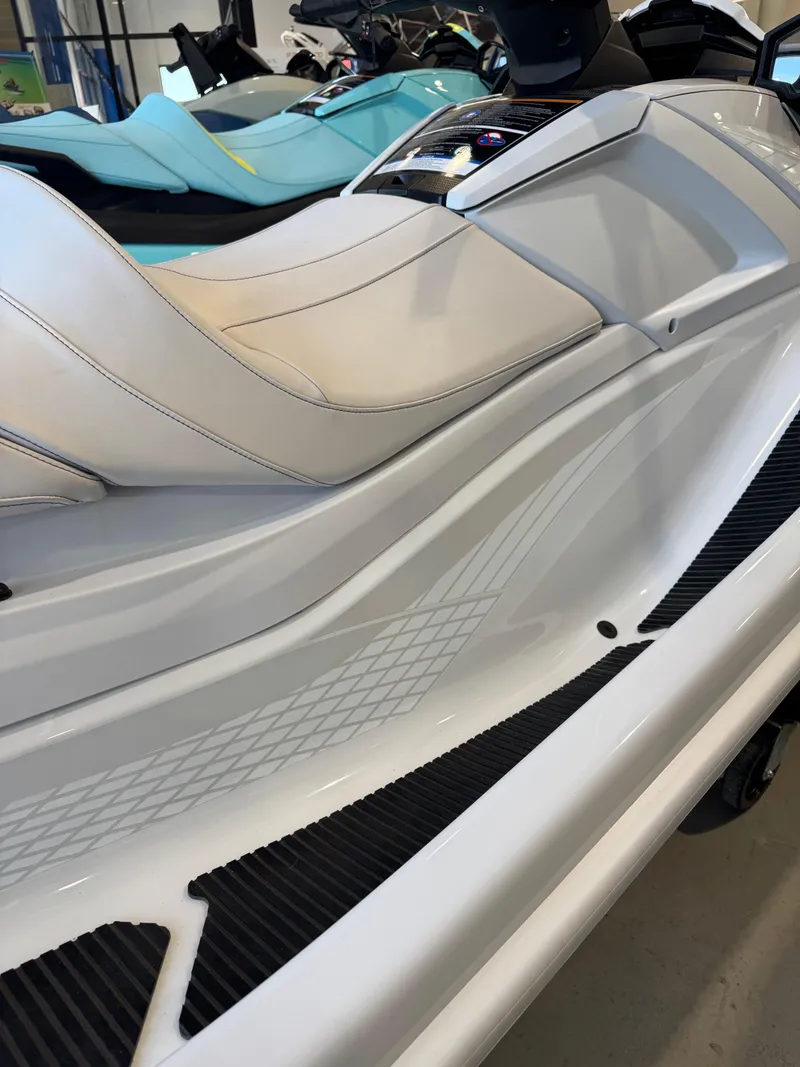 Slide: The Image of 2025 Yamaha WaveRunner VX Cruiser with sleek white design and comfortable seating. - 6